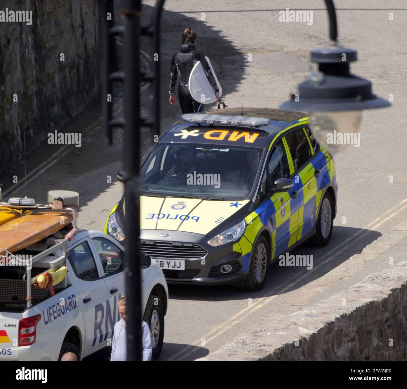 Cornwall UK, Newquay`s Towan beach, A strange head to head as London Transport police in a distinctive vehicle come head to head with Cornish beach culture. five thousand five hundred officers are being drafted in from across the country to police the G7 Conference at Carbis Bay. 22nd May 2021. Credit: Robert Taylor/Alamy Live News Stock Photo